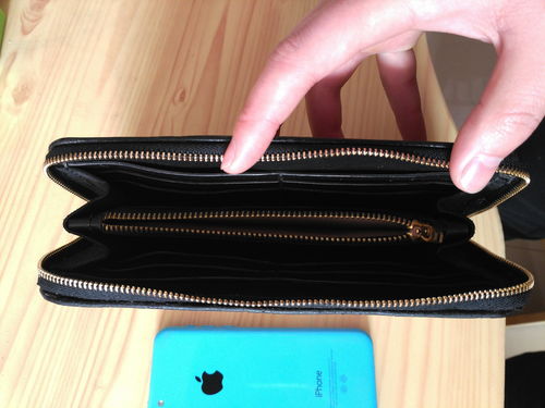 武士貓皮雕拉鏈包